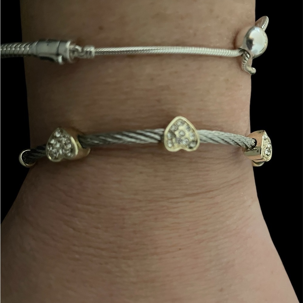 Unbranded silver and gold tone heart bracelet with crystals in the hearts